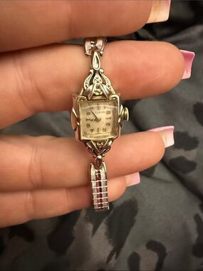 Bulova Women's Silver-Tone Filigree Bracelet Watch with Ivory Dial